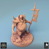 High angle view of a bulky executioner figure holding a halberd, standing on a rubble-strewn circular base.