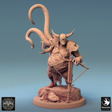 Front view of the armored, one-eyed executioner miniature posing with a large crossbow on a stone base.