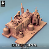 Perspektive von vorne rechts auf das Resin Tabletop-Diorama mit Händlerfiguren.