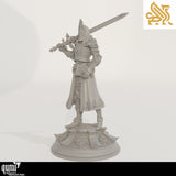 Angled side view of the Paladin miniature highlighting the sword and shield book design