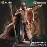 Jonas the Trick illusionist wizard miniature figure in gray resin standing with a staff and pointing.