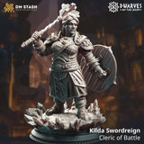 Kilda the Human Cleric 3D-printed resin miniature standing on a crystal base with a warhammer and shield.