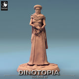 Front view of a 3D-printed human female NPC miniature wearing a headscarf and flowing robes.