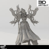 Rear view of the elf wizard miniature displaying flowing robes and ornamental back armor panels.