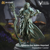 Synoria the Noble Hearted elf caster miniature in 32mm scale made of gray resin standing with a staff in a forest