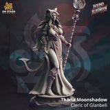 Tharia Moonshadow cleric miniature holding a staff on a decorative base