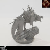 Rear angle view of a gray 3D-printed monster miniature standing on a log base, showing spines and tail detail.