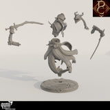 Exploded view showing the miniature parts including body, arms, and head before assembly
