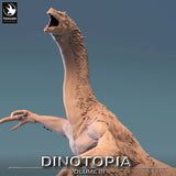 Close-up of the open-mouthed Therizinosaurus head and clawed forelimb.