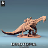 Side profile of feathered Therizinosaurus miniature with saddle and gear on a base with pots.