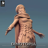 Close-up of the human NPC figure's upper body highlighting the headscarf, jewelry, and ornate textured clothing.
