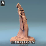 Side profile view of the human NPC miniature looking upwards with detailed turban and robes.