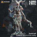 Digital render of Turak'tali Druid miniature with antler headdress and skull-adorned staff.