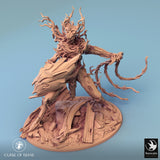 Tree monster miniature, side profile, arm raised holding a large wooden blade.