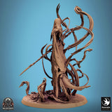 Side profile of the banshee miniature showing the tattered robe and long spear weapon details.