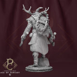 Back view of the antlered warrior wearing a large bear trap on his back with axes in hand.