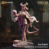 Ivy Dupré wizard miniature standing on a book-strewn base, featuring horns and a spell orb in hand, gray resin finish.