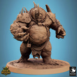 Front view of a chained, horned Gutspawn monster miniature with spiked armor, standing on a circular base.