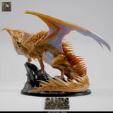Front-angle view of the Topaz Adult Dragon miniature with wings spread wide.