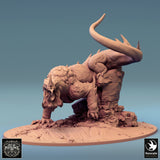 Side profile of a monstrous Sludgeborn creature perched on a rock formation, showing textured skin and long tail.