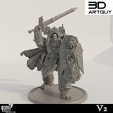 Krieger-Miniatur mit großem Schwert und detailreichem Schild mit Totenkopf- und Flügelreliefs, Vorderansicht.