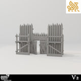 A gate section of the Koldeni encampment palisade wall with double doors and defensive barricades.