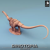 Rear angle view of the long-necked dinosaur miniature with ornate harness details.