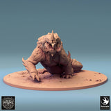 Frontal view of the Sludgeborn miniature, highlighting the sharp horn and detailed maw of the beast.