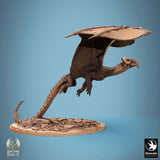 Full body shot of the flying dragon miniature, side view with detailed scales.