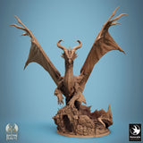 Front view of a fierce bronze dragon miniature posed on a ruin-themed base for tabletop gaming.