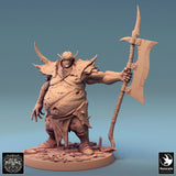 Front view of an armored, bloated executioner miniature holding a large poleaxe on a rubble-strewn circular base.