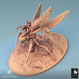 Side view of the Fyrionis creature with a rider, displayed on a textured oval base.