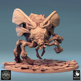 Front view of the insectoid miniature captured in a dynamic, aggressive pose.