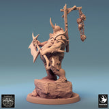 Executioner miniature with a skull-adorned gallows post on his back, viewed from the side on a rock base.