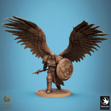 Front-side view of the winged warrior miniature with a detailed shield and spear, standing on a round base.