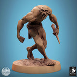 Ghoul miniature with shoulder spikes, crouching low while holding a bone club.