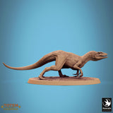Running raptor miniature with mouth open on an oval base.