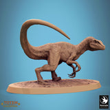 Side profile of a raptor miniature standing on an oval base.