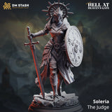 Close-up of the winged angel judge miniature featuring detailed armor and halo, displayed against a dark background