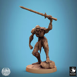 Ghoul warrior in a menacing stance with a sword, viewed from the front.